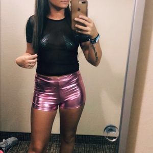 Black mesh top and pink shorts